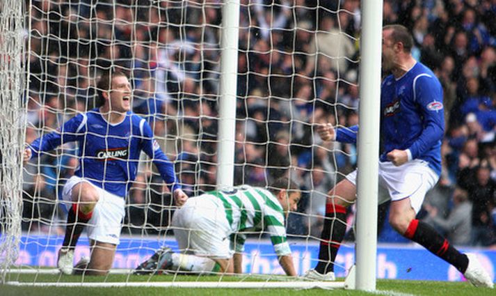 Steve Davis fagnar marki sínu í dag.