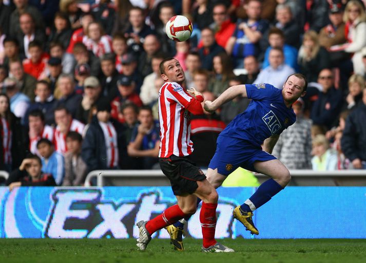 Rooney og Bardsley í leik United og Sunderland 2009.
