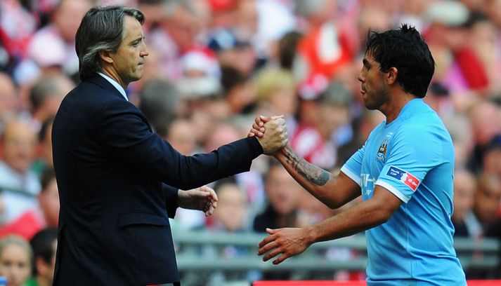 Carlos Tevez og Roberto Mancini.