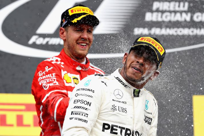 Það fór vel á með Lewis Hamilton og Sebastian Vettel á verðlaunapallinum.