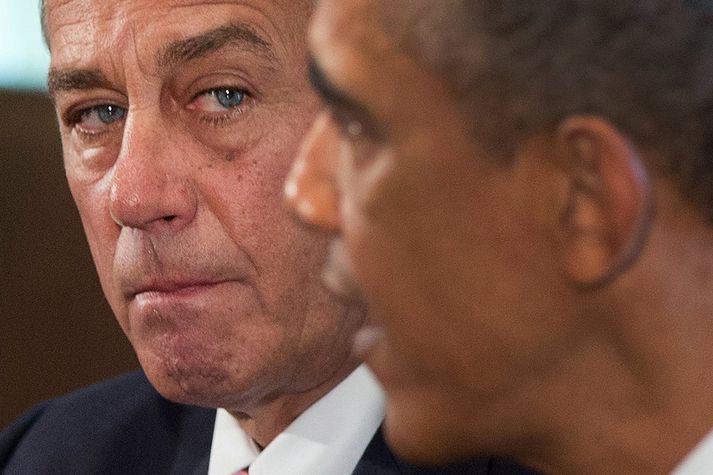 John Boehner, forseti fulltrúadeildar þingsins, fylgist með Obama ræða við fjölmiðla um ástandið og fyrirætlanir sínar varðandi Sýrland, í gær.