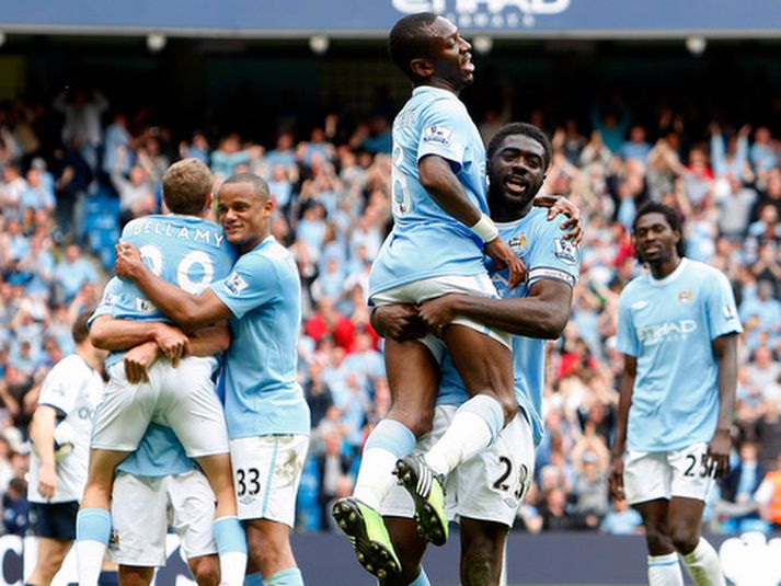 Leikmenn Manchester City fagna sigrinum í dag.