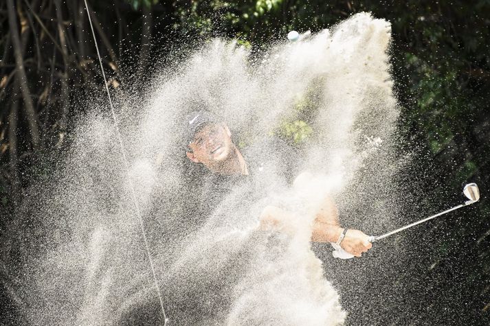 Patrick Reed slær upp úr glompu á mótinu í Mexíkó um helgina þar sem hann stóð uppi sem sigurvegari.