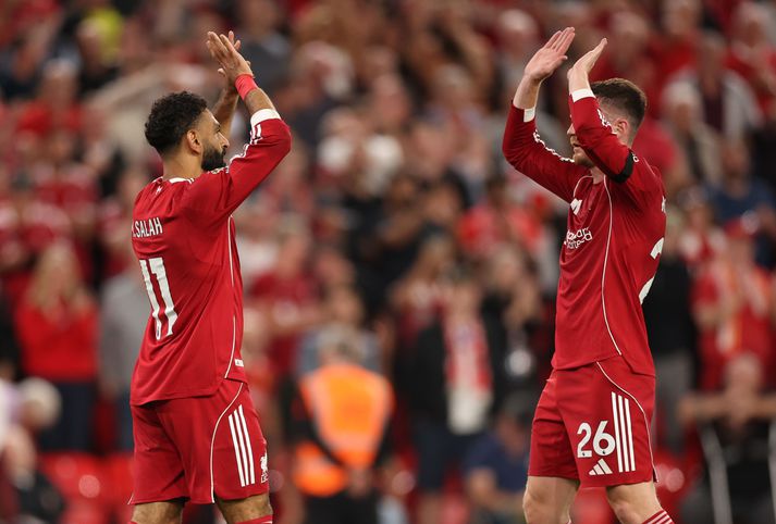 English Premier League - Liverpool vs Bournemouth epa12303486 Mohamed Salah of Liverpool celebrates scoring the 4-2 goal with Andrew Robertson during the English Premier League match between Liverpool FC and AFC Bournemouth, in Liverpool, Britain, 15 August 2025.  EPA/ADAM VAUGHAN EDITORIAL USE ONLY. No use with unauthorized audio, video, data, fixture lists, club/league logos, 'live' services or NFTs. Online in-match use limited to 120 images, no video emulation. No use in betting, games or single club/league/player publications.