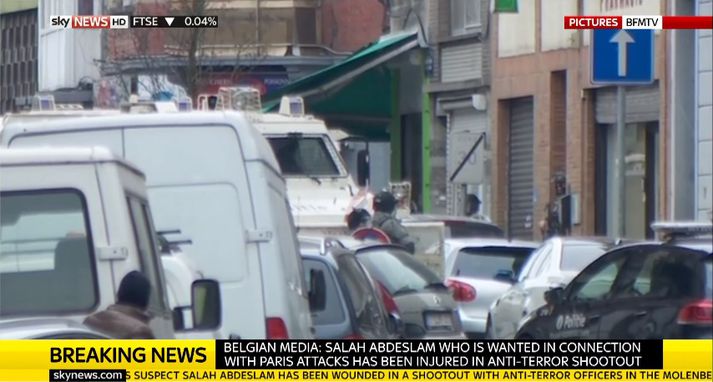 Samkvæmt frétt Sky hefur Salah Abdeslam, sem grunaður er um að vera einn af höfuðpaurum hryðjuverkaárásanna í París, verið skotinn í aðgerðum í lögreglu í Brussel. Mynd úr útsendingu Sky News frá vettvangi.