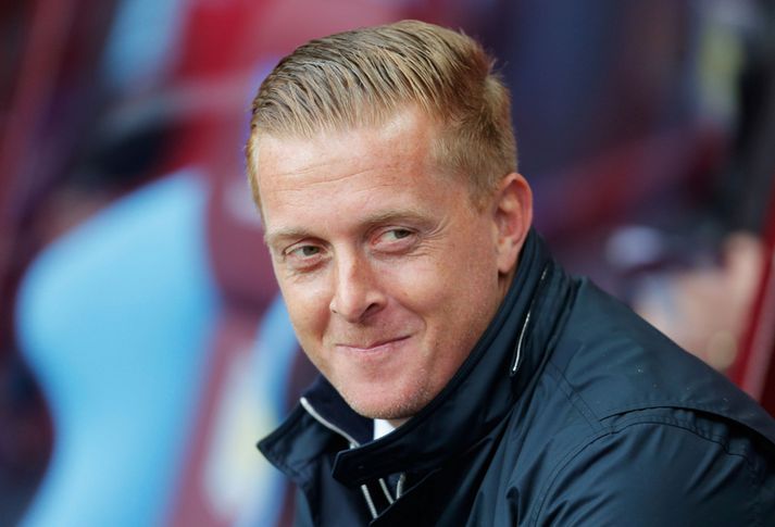 Garry Monk, knattspyrnustjóri Swansea, getur brosað enn um sinn að minnsta kosti.