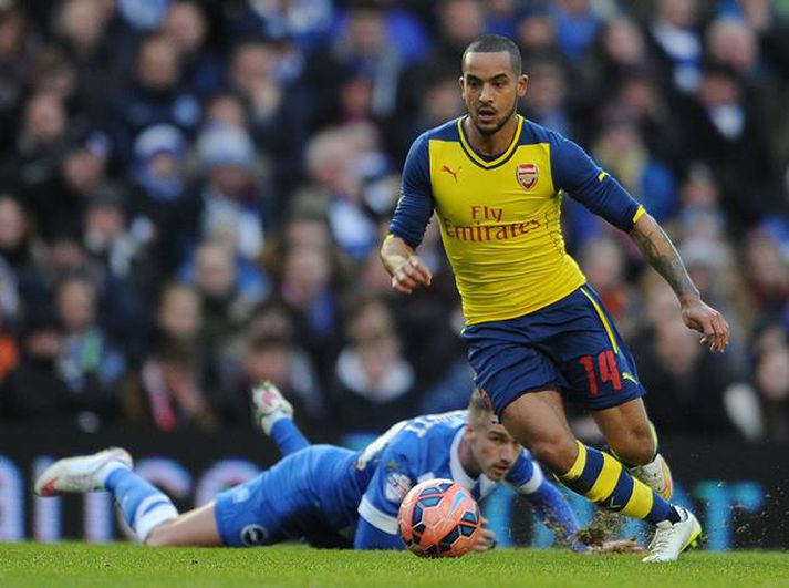 Walcott kom Arsenal á bragðið gegn Brighton.