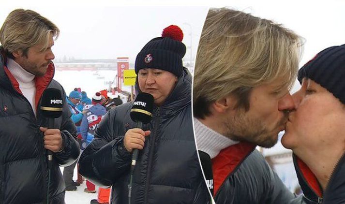 Andrei sést hér ræða við Jelena Välbe sem svo smellti á honum kossi.