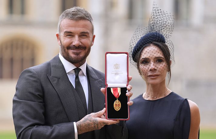Sir David Beckham og Victoria kona hans voru saman við athöfnina í dag.