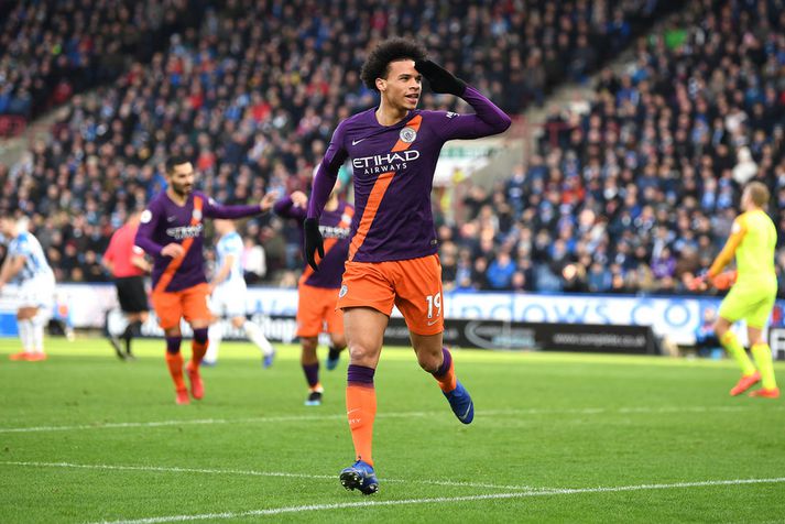 Leroy Sane fagnar marki sínu á móti Huddersfield Town í gær.