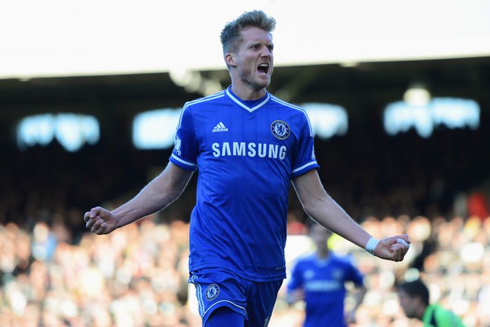 Andre Schurrle fagnar marki.