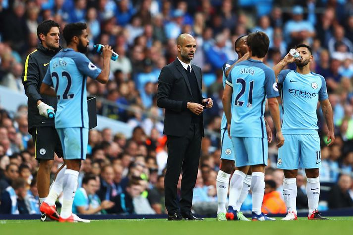 Guardiola ásamt strákunum sínum.