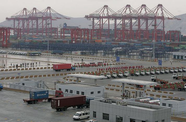 Shanghai. Uppbyggingin í stórborgum Kína og góðærið þar hafa ekki náð til allra hluta landsins og víða eru bændur ósáttir.