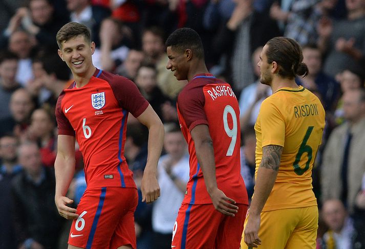 Marcus Rashford fagnar marki sínu í kvöld.