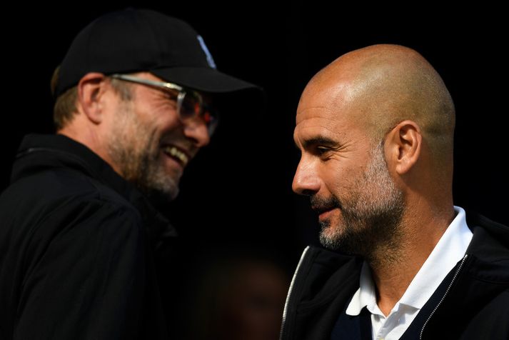 Pep Guardiola, knattspyrnustjóri Manchester City og Jürgen Klopp, knattspyrnustjóri Liverpool.