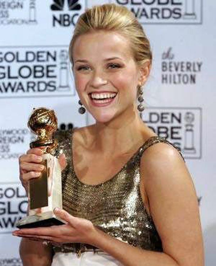 Reese Witherspoon komst ekki á réttum tíma í brúðkaupsferðalagið sitt vegna vinnu.
Nordicphotos/getty