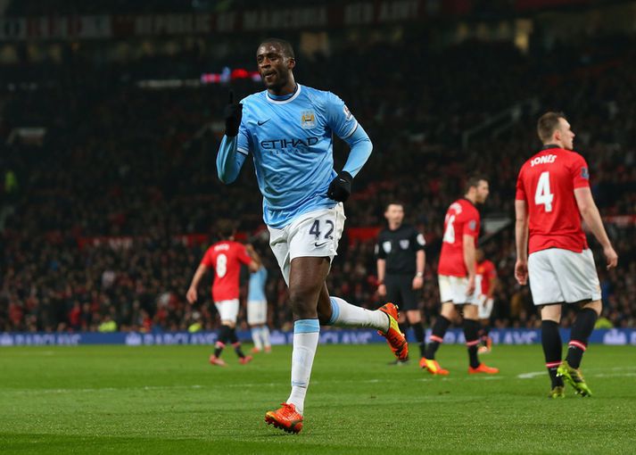 Yaya Toure fagnar marki í leik með Manchester City.