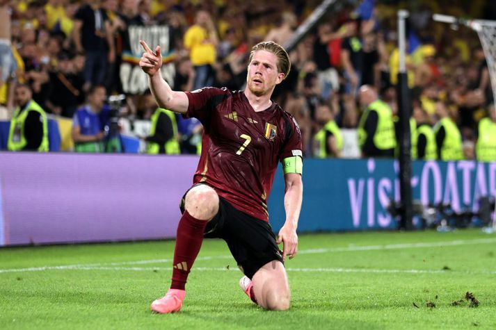 Kevin De Bruyne fagnar marki sínu sem innsiglaði sigurinn