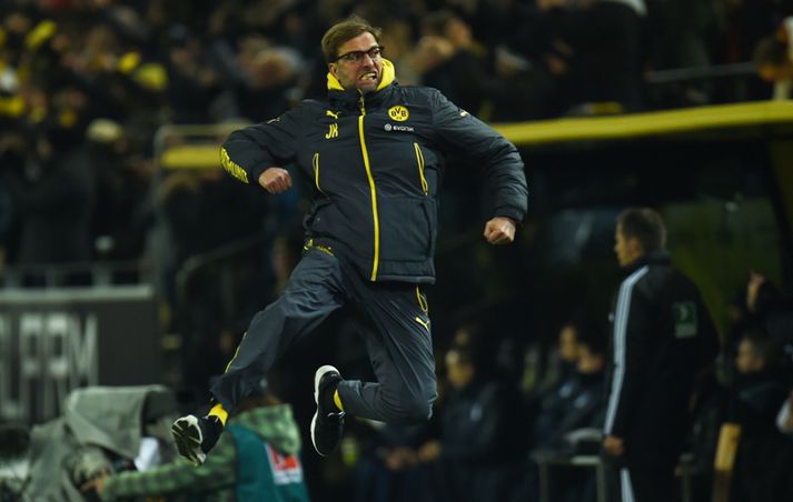 Jurgen Klopp, þjálfari Dortmund, fagnar hér sigurmarki leiksins. Eins og sjá má var mikið lagt í fagnið.