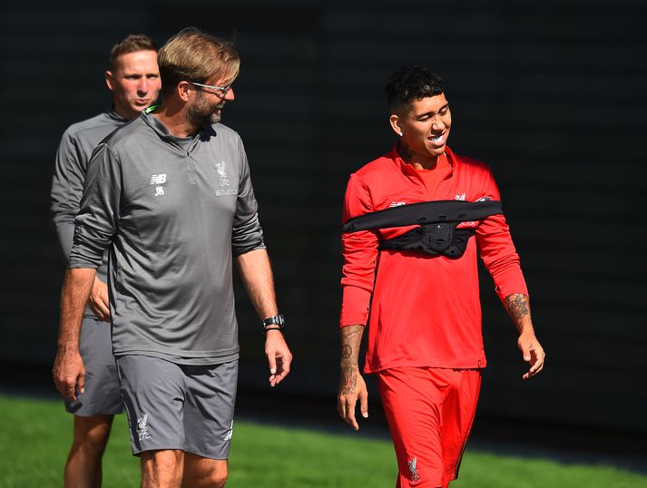 Klopp og Firmino á góðri stundu.