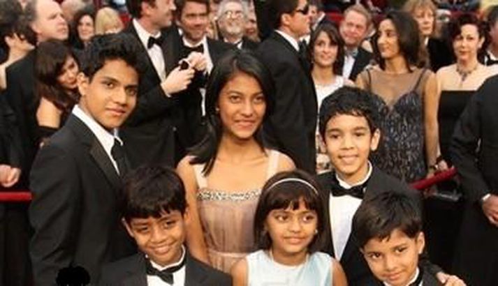 Börnin úr Slumdog Millionaire.