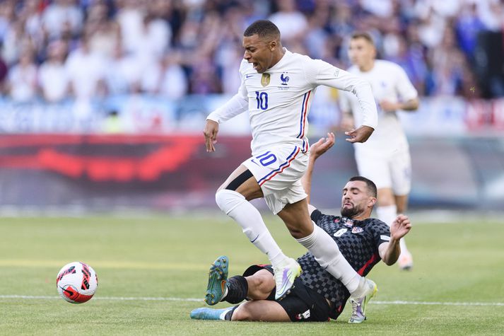 Kylian Mbappé og Mateo Kovacic eigast við í leiknum í kvöld.