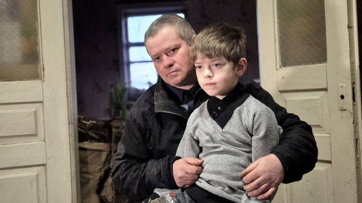 Úkraínsku feðgarnir Andrii og Serhiy sem er sex ára.
