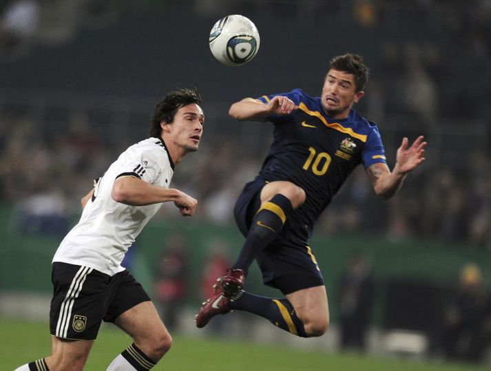 Harry Kewell í landsleik með Ástralíu.