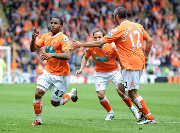 Leikmenn Blackpool fagna í dag.
