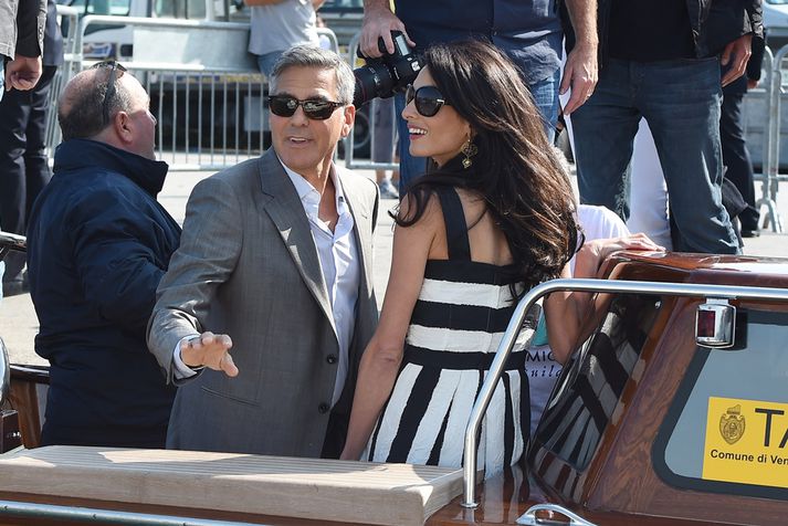 Clooney og Alamuddin við komuna til Feneyja í gær.