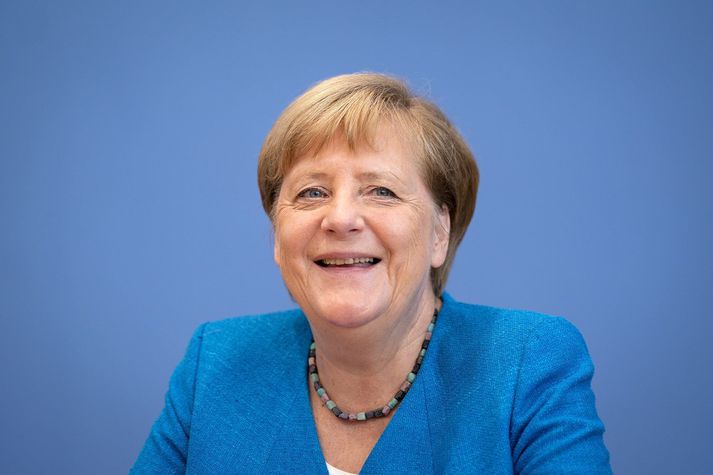 Angela Merkel brosti við þegar hún var spurð út í það hvort Trump hefði heillað hana.