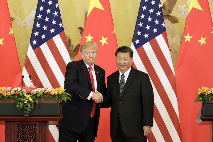 Trump og Xi Jinping á góðri stundu fyrir ári síðan en það andar ekki sérlega hlýju á milli þeirra þessi dægrin.