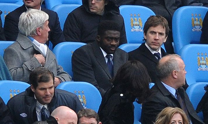 Toure upp í stúku á leik með City.