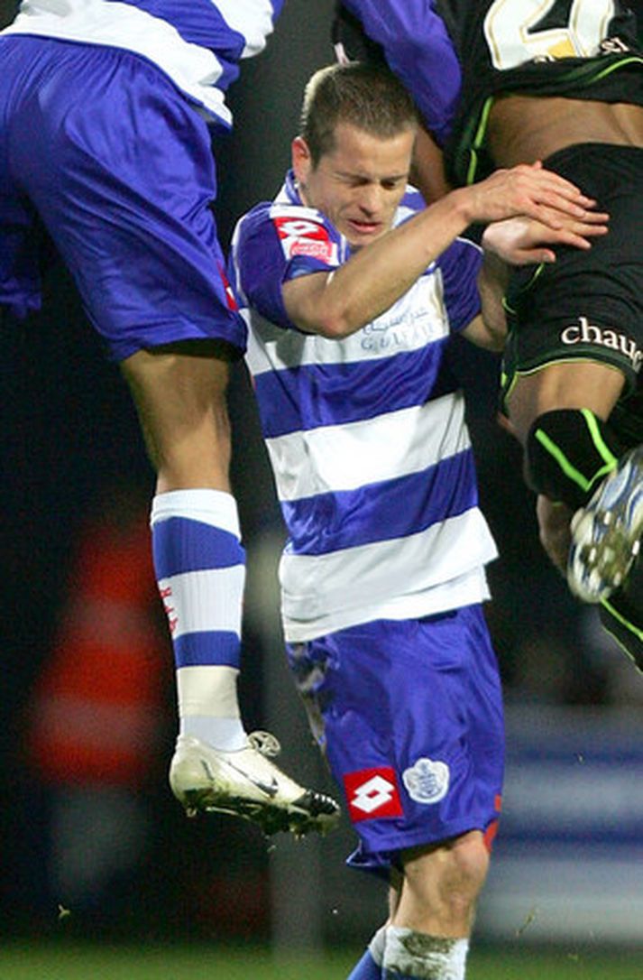 Heiðar er hér klemmdur á milli tveggja leikmanna í leik QPR og Wolves um síðustu helgi.