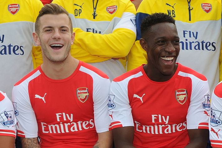 Jack Wilshere og Danny Welbeck hlæja að kaupverðinu.