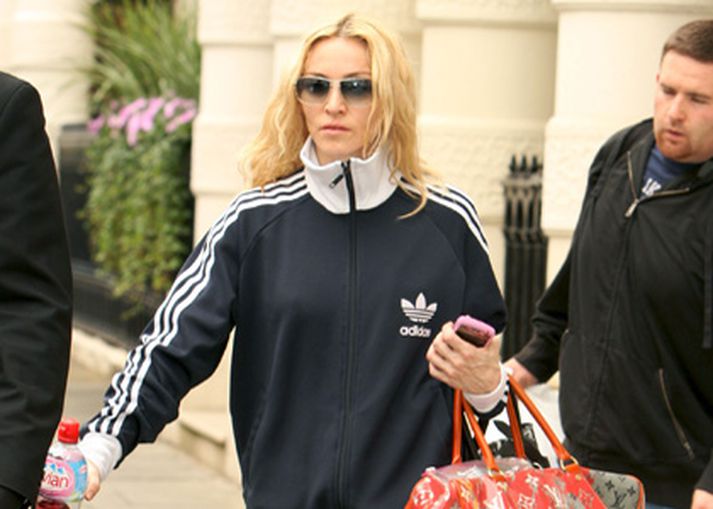 Madonna hefur alltaf haldið sér í góðri þjálfun. Hér með sínum fyrrverandi Guy Richie.