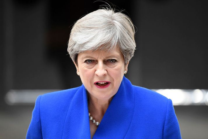 Theresa May eftir fund sinn með drottningu í dag.