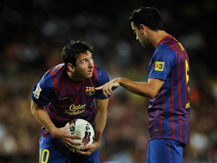 Lionel Messi og Xavi.