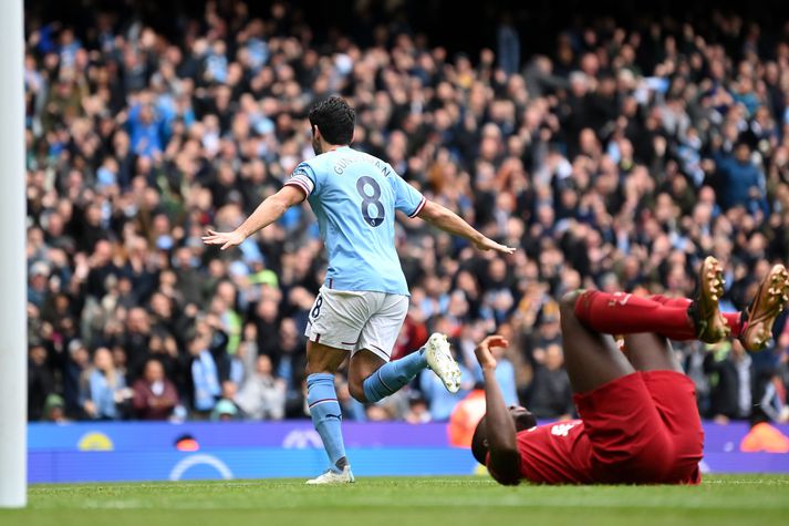 Ilkay Gündogan fagnar marki sínu fyrir Manchester City í sigri á móti Liverpool.