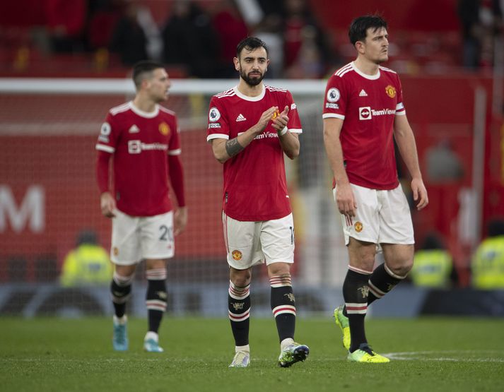 Manchester United v Southampton - Premier League MANCHESTER, ENGLAND - FEBRUARY 12: Diogo Dalot, Bruno Fernandes and Harry Maguire of Manchester United after the Premier League match between Manchester United and Southampton at Old Trafford on February 12, 2022 in Manchester, United Kingdom. (Photo by Visionhaus/Getty Images)