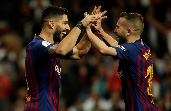 Suarez og Alba fagna.