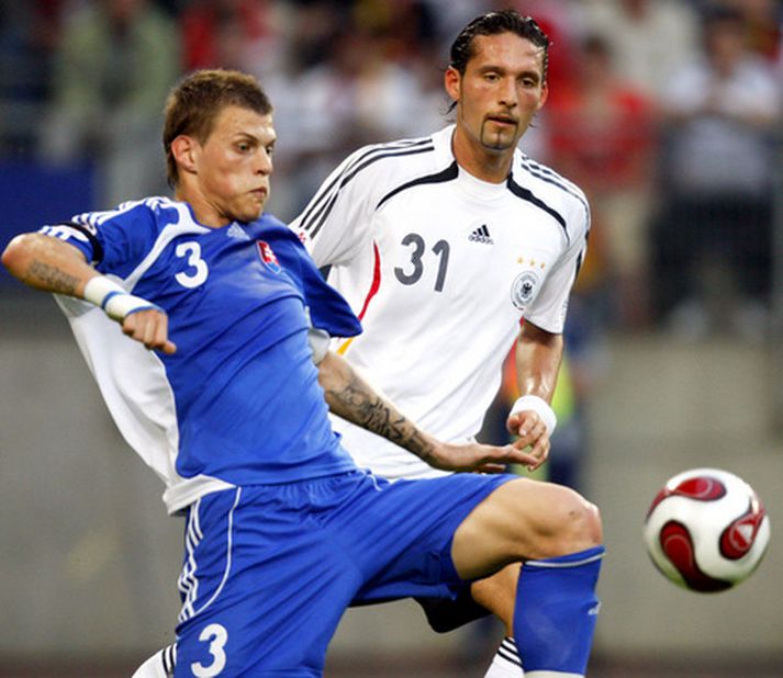 Martin Skrtel í leik með landsliði Slóvakíu gegn Þjóðverjanum Kevin Kuranyi.