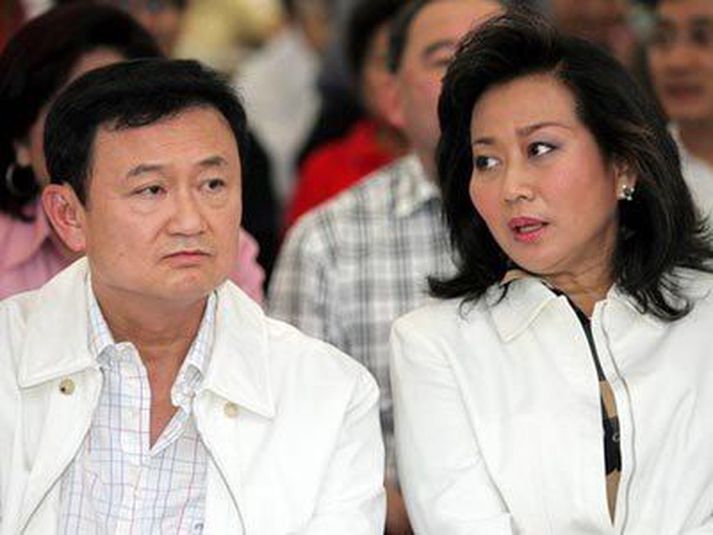 Thaksin Sinawatra og eiginkona hans.