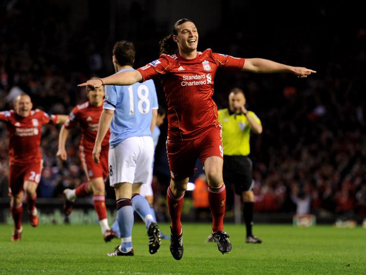 Andy Carroll fagnar hér marki fyrir Liverpool.