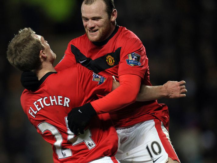 Wayne Rooney og Darren Fletcher fagna fyrsta marki liðsins.