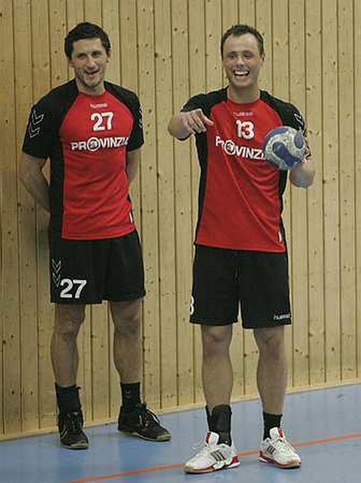 Einar Hólmgeirsson er hér með liðsfélaga sínum, Alexander Petersson.