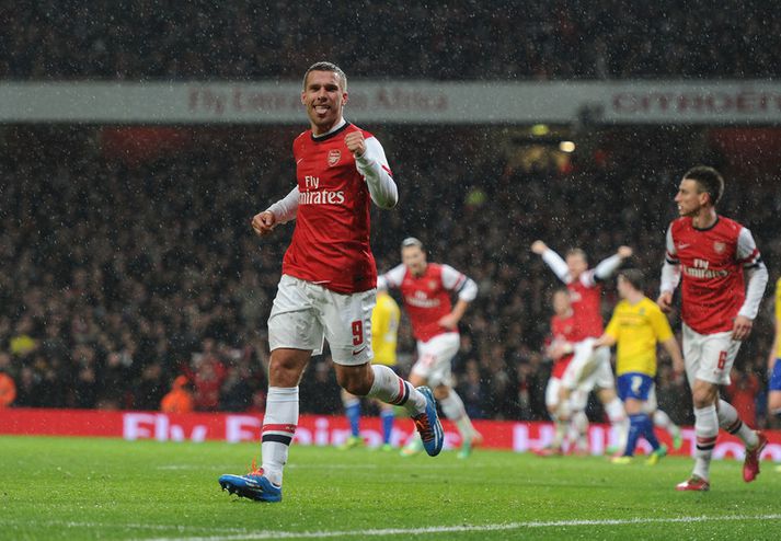 Lukas Podolski fagnar í kvöld.