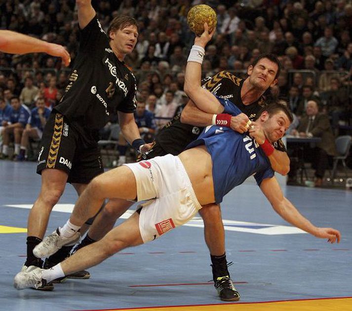 Róbert Gunnarsson skoraði sigurmark gegn Minden skömmu fyrir leikslok.
 nordic photos/bongarts