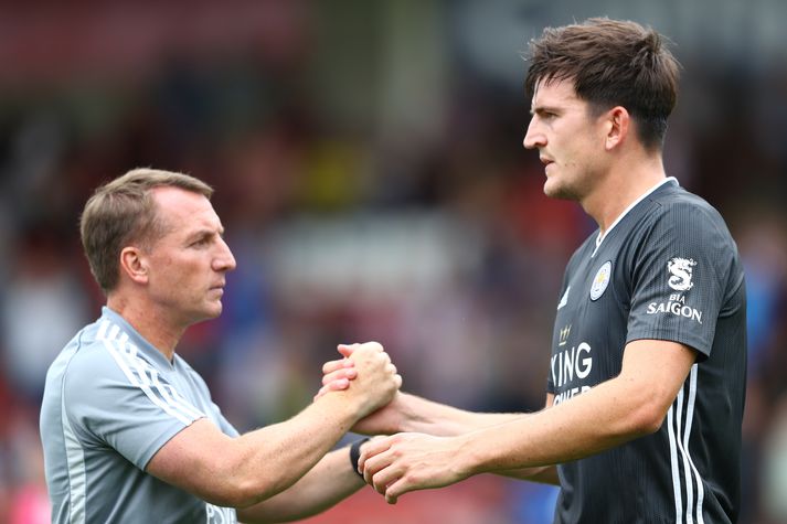 Brendan Rodgers og Harry Maguire.