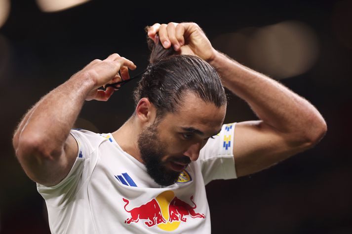 Dominic Calvert-Lewin lagar hárteygjuna eftir hártogið.